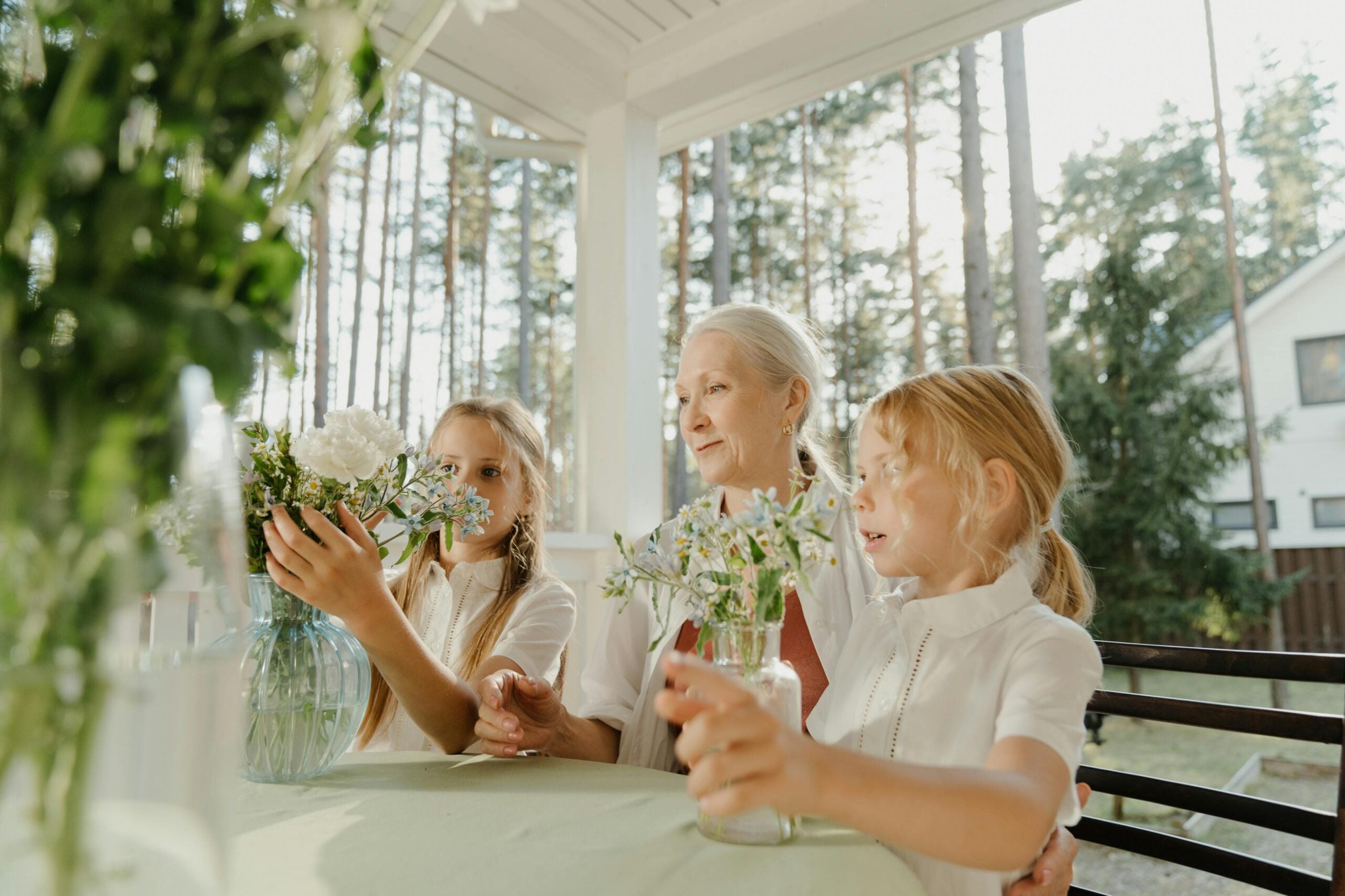 Grandmother spending quality time with her grandchildren, enjoying everyday activities after regenerative treatment