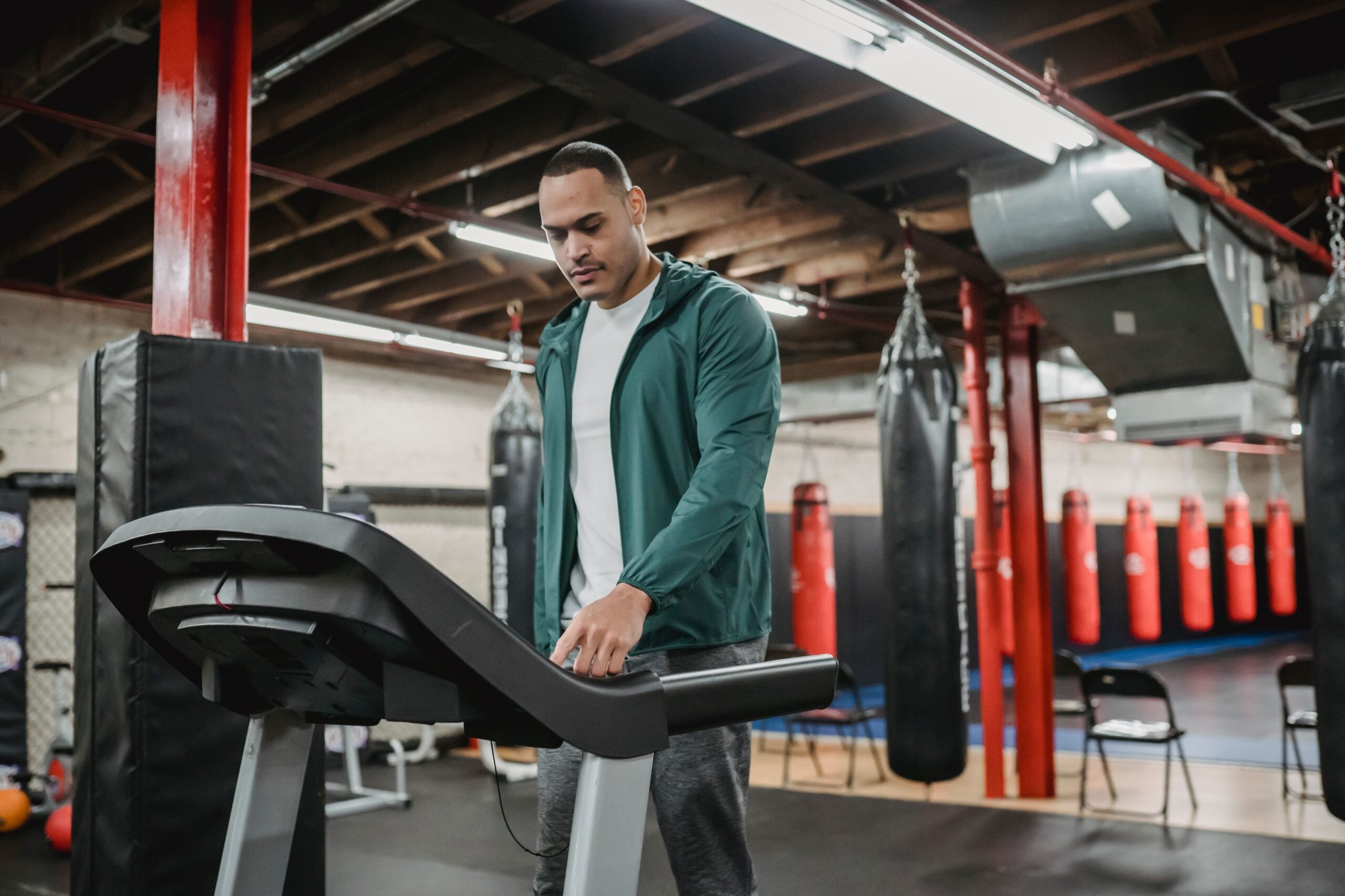 Man staying active on a treadmill as part of recovery and conditioning