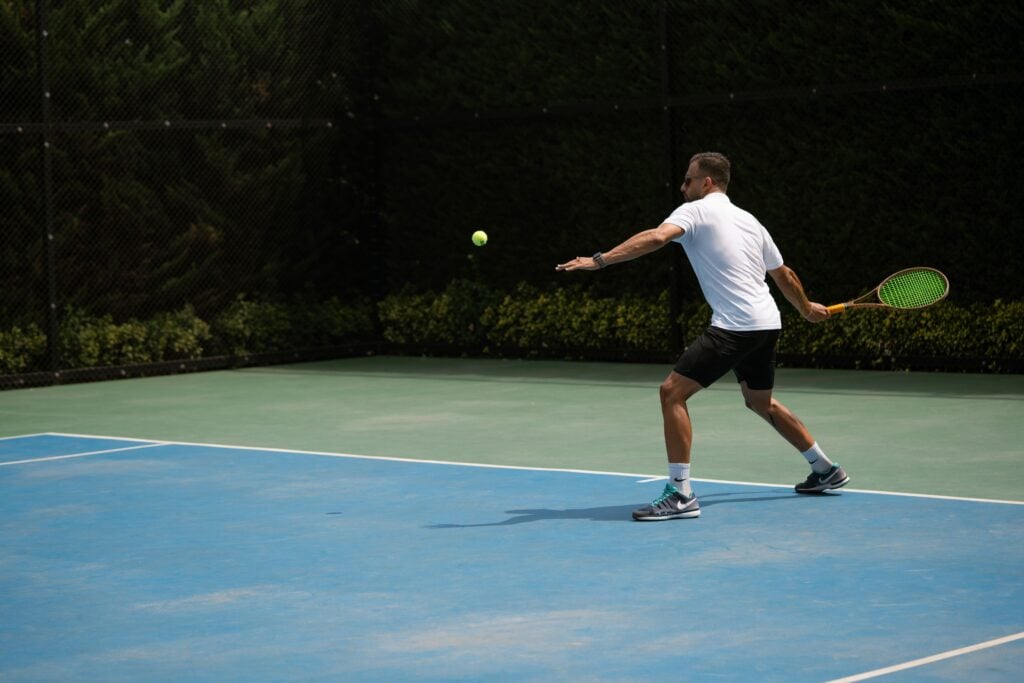overcoming player with tennis elbow and shoulder pain